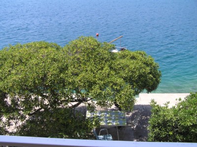 Private beach in front of the house