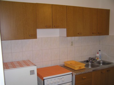Fully equipped kitchen with 4-ring stove + owen, coffee machine and dining area